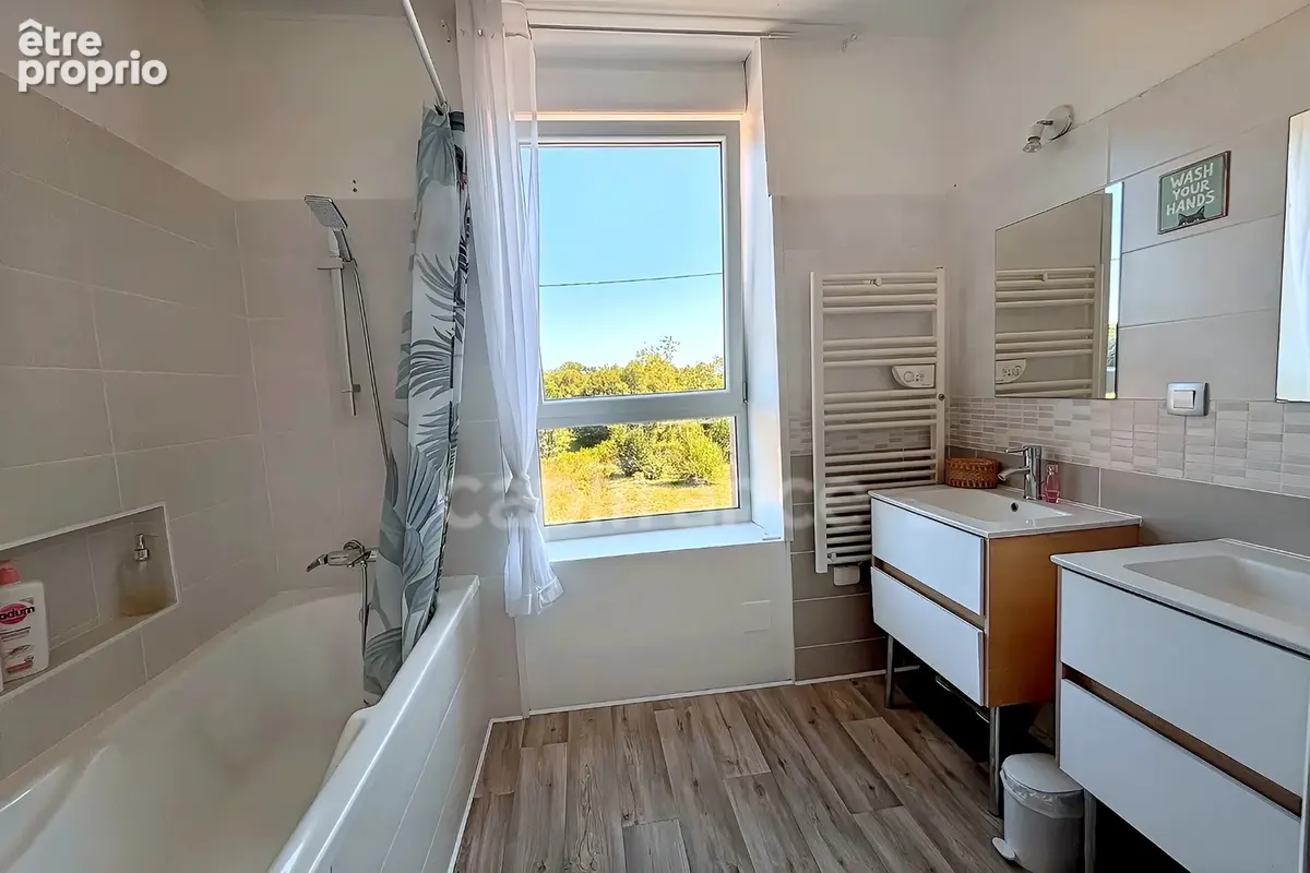 Charmante maison en pierre de 122m², 3 chambres avec jardin, terrasse, cave à GUENGAT(29) - photo 9