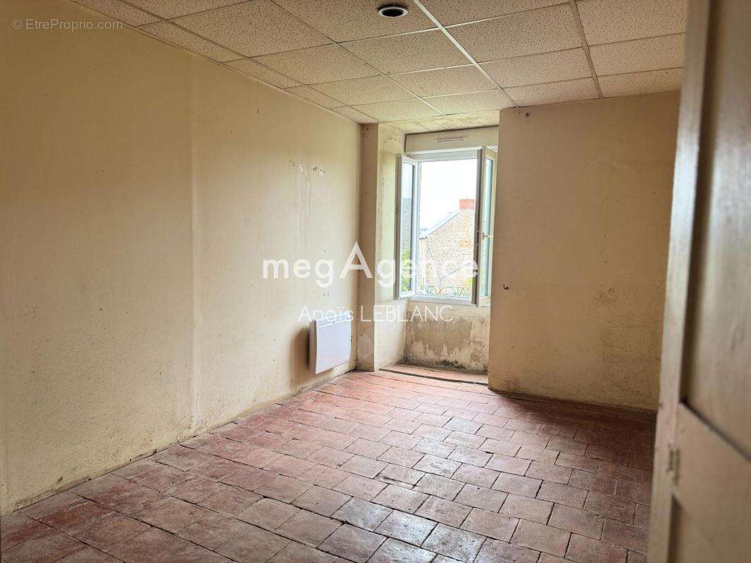 Maison en pierre au cœur d'un village proche du Mans - photo 6