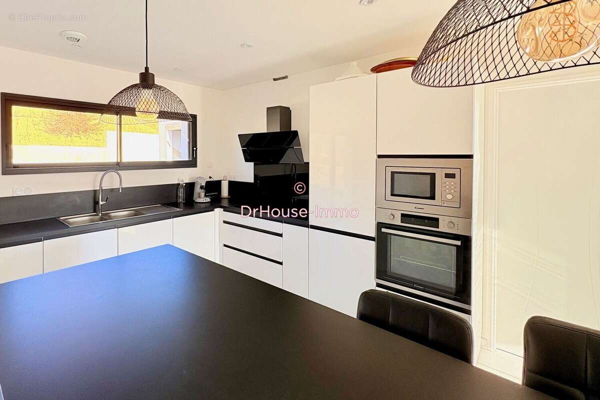 Maison à COUFFOULENS