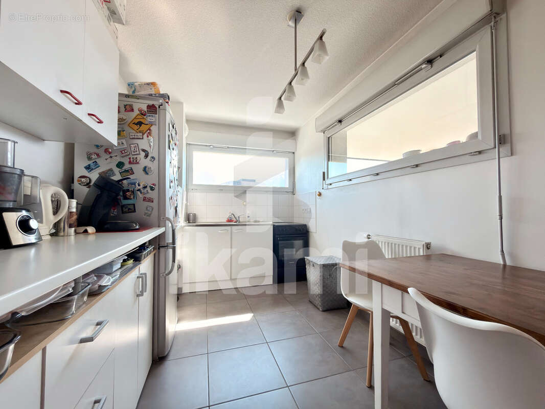 Appartement T3 au dernier étage   Terrasse, vue dégagée et garage - photo 2