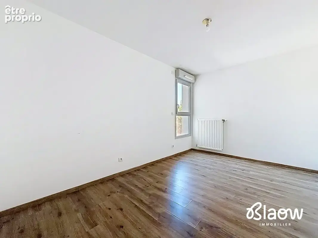 Appartement 4 pièces 88 m² à vendre à Decines-Charpieu (69150) - photo 9