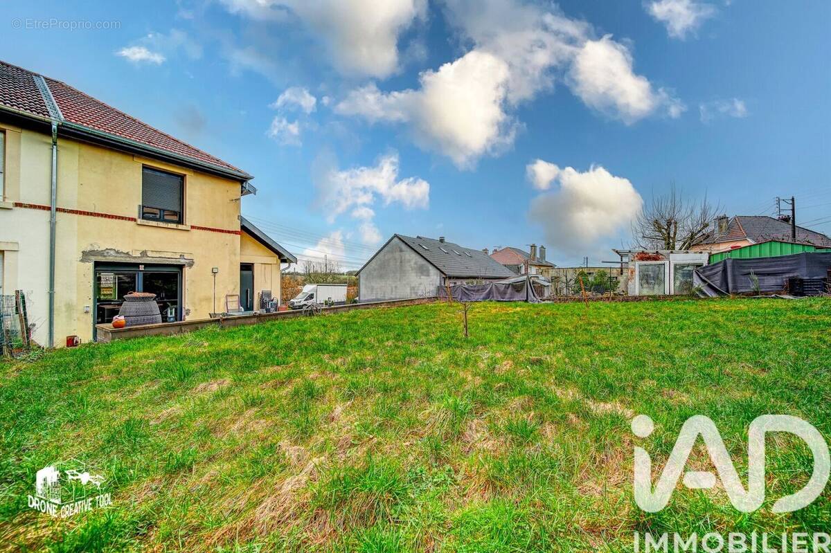 Photo 1 - Maison à AUDUN-LE-ROMAN