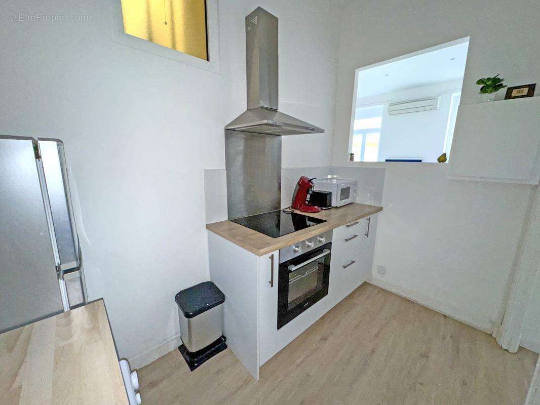 Appartement NICE 3 pièce(s) Carré d'Or - photo 7