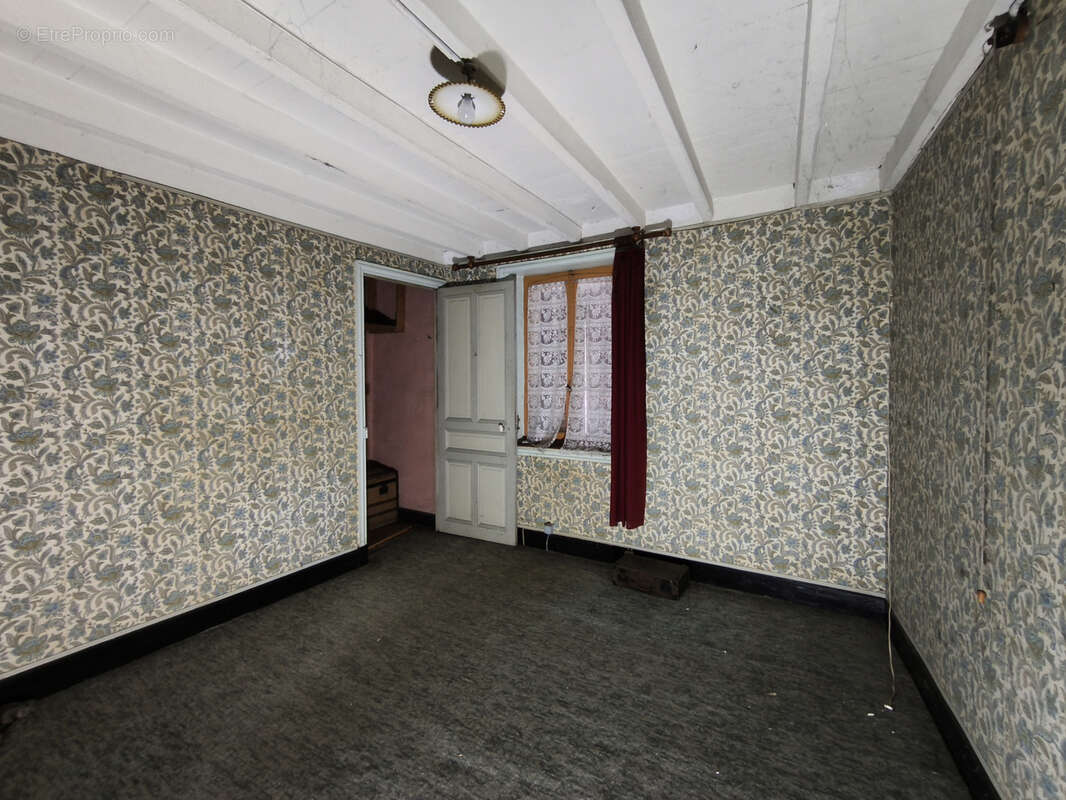 Maison à ESCOUTOUX