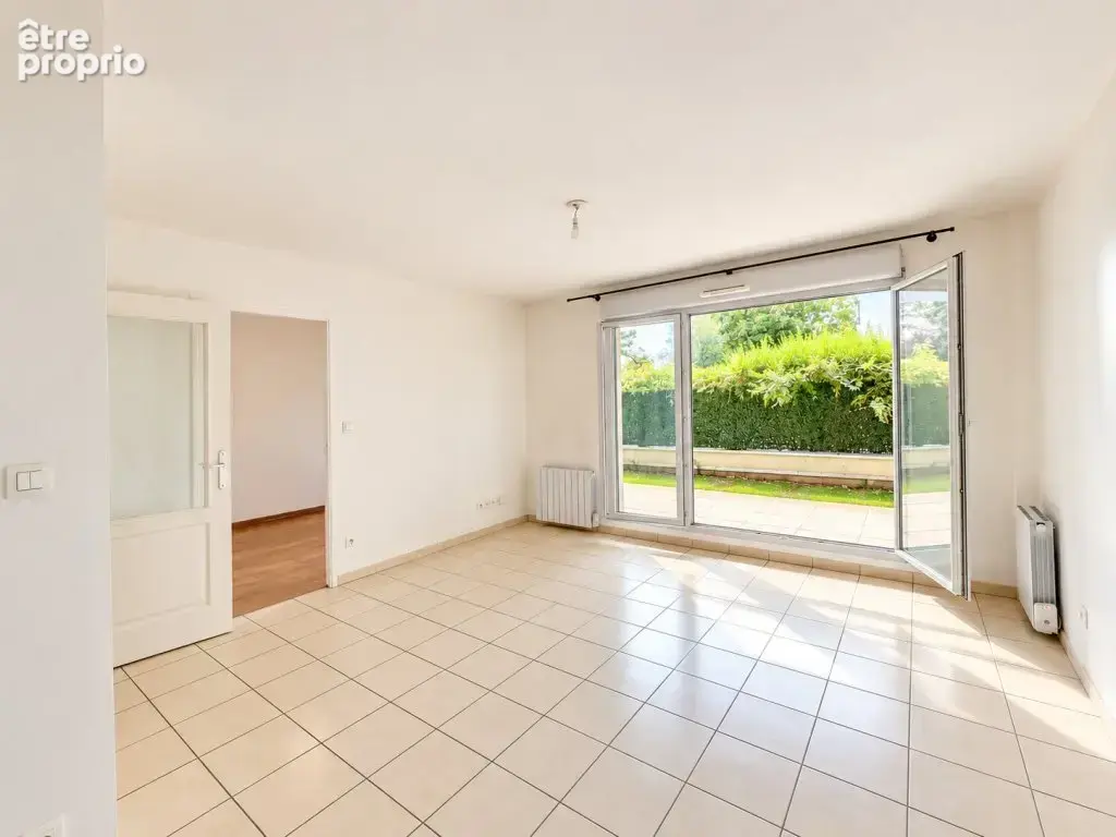 EXCLUSIVITÉ - TASSIN - 134, rue Joliot Curie, T2 en rez-de-jardin - photo 3
