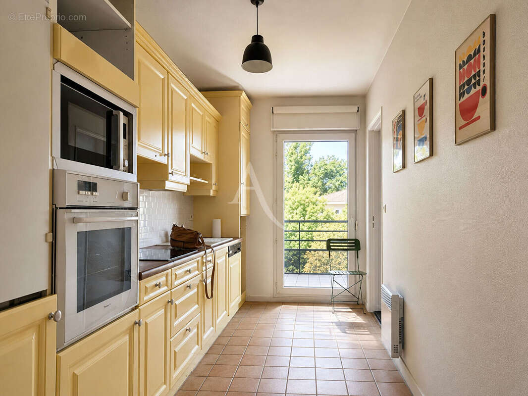 GRADIGNAN CENTRE - Appartement T3 de 76m² dans résidence de standing - photo 4