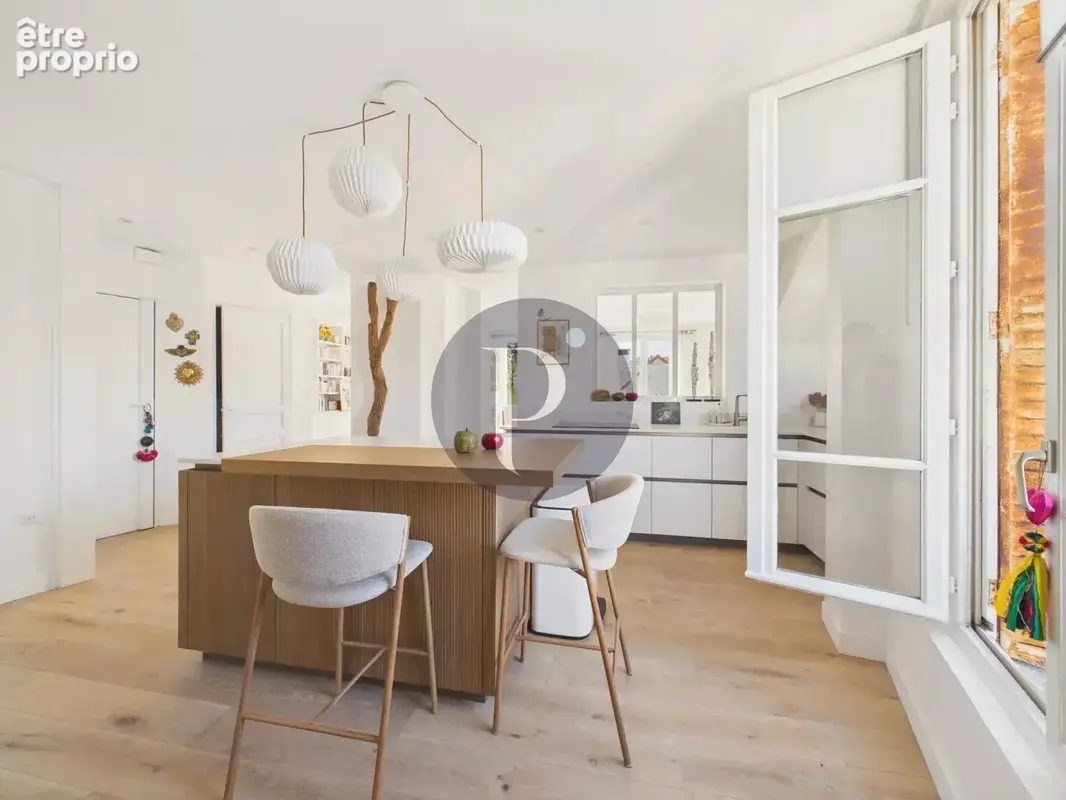 La surprise sous les toits : duplex style loft exceptionnel. - photo 8