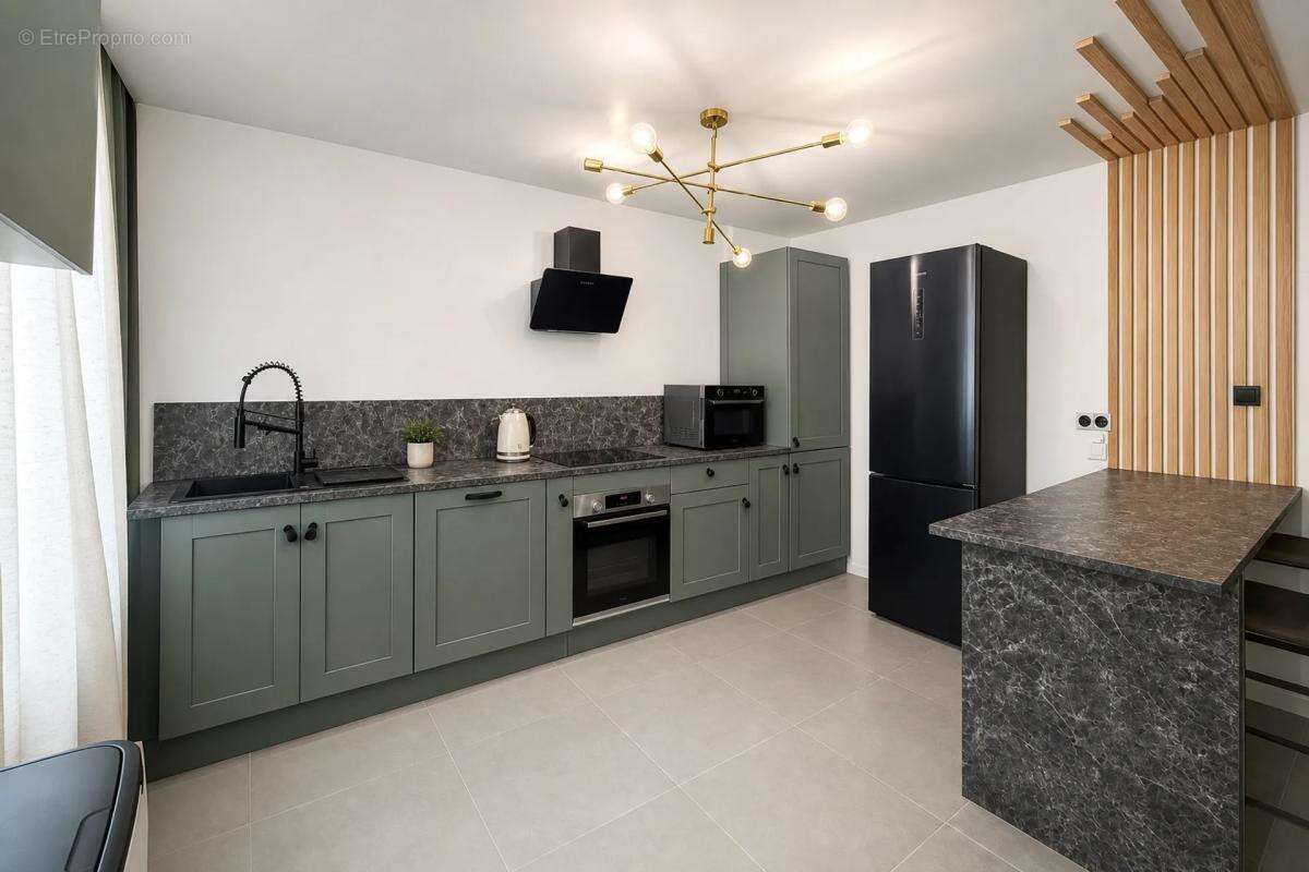 Appartement de 4 pièces de 109 m² à Saint-Étienne - photo 4