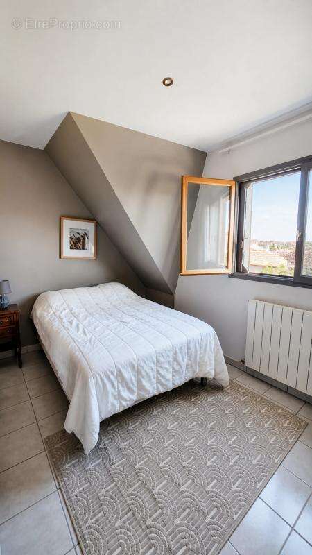 Maison de 6 pièces de 115 m² située à Drancy - photo 5