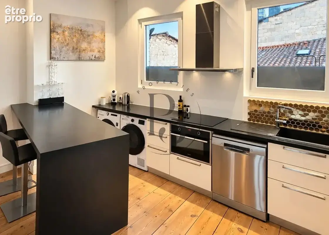 Libourne - appartement t2 de 80m2 alliant elegance contemporaine et charme de l'ancien - photo 5