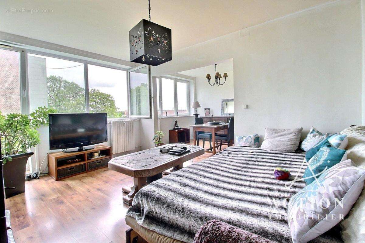 Appartement t3 - 69 m² - 2 chambres - cave - photo 7