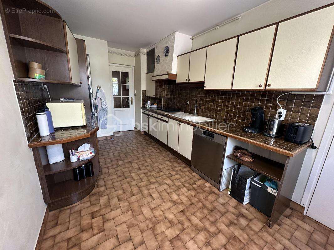 Appartement en rez de jardin avec garage + place de parking privative - photo 6