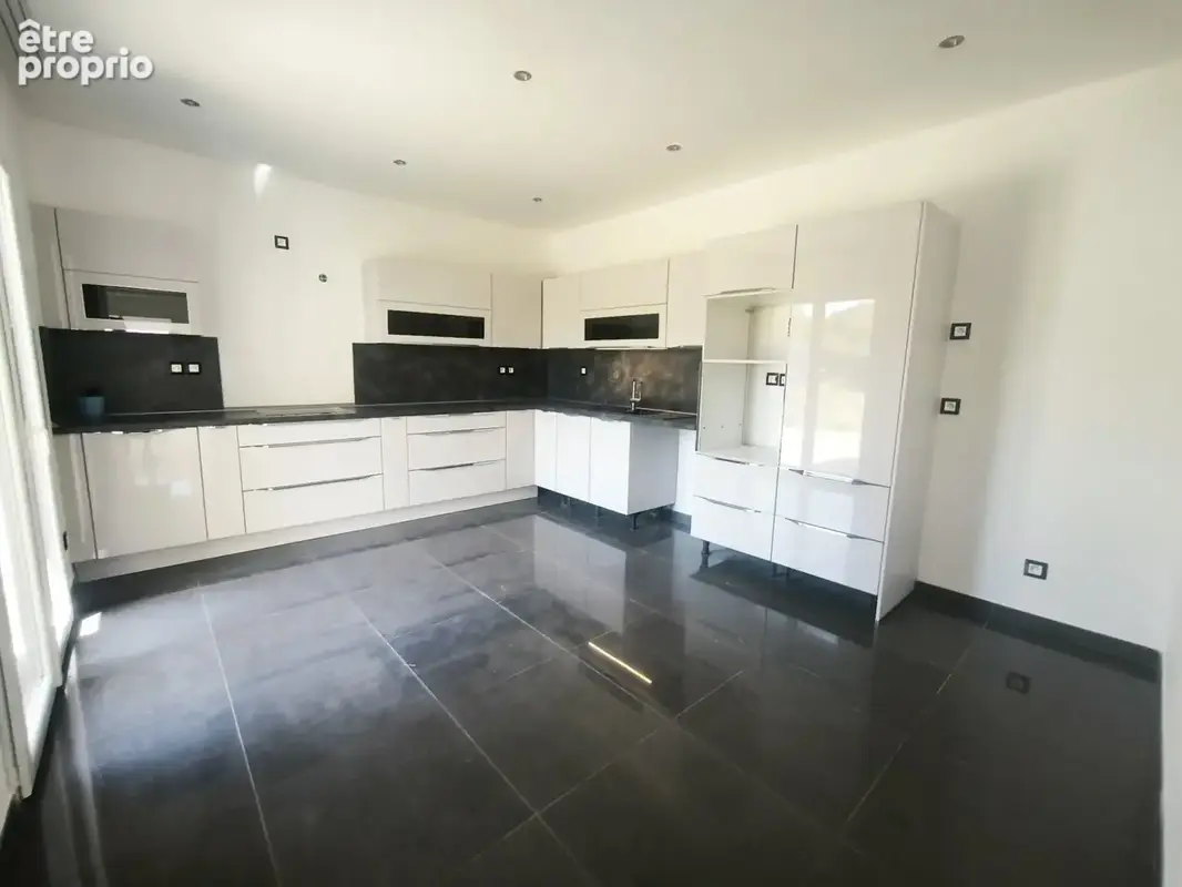 Maison 6 pièces 144 m² à vendre à Genilac (42800) - photo 9