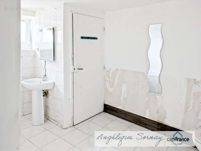  EXCLUSIVITÉ – Maison mitoyenne à fort potentiel de 229 m² sur 3 niveaux avec garage – Sellières - photo 11