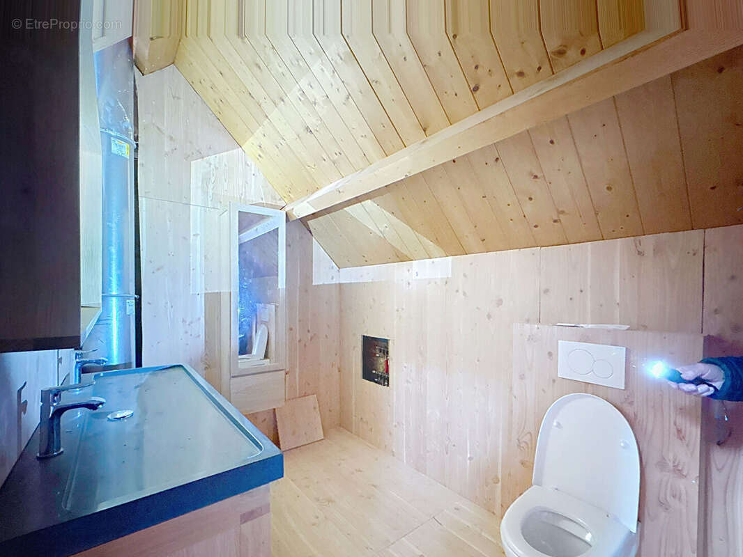Grande maison à ossature et bardage bois - photo 11