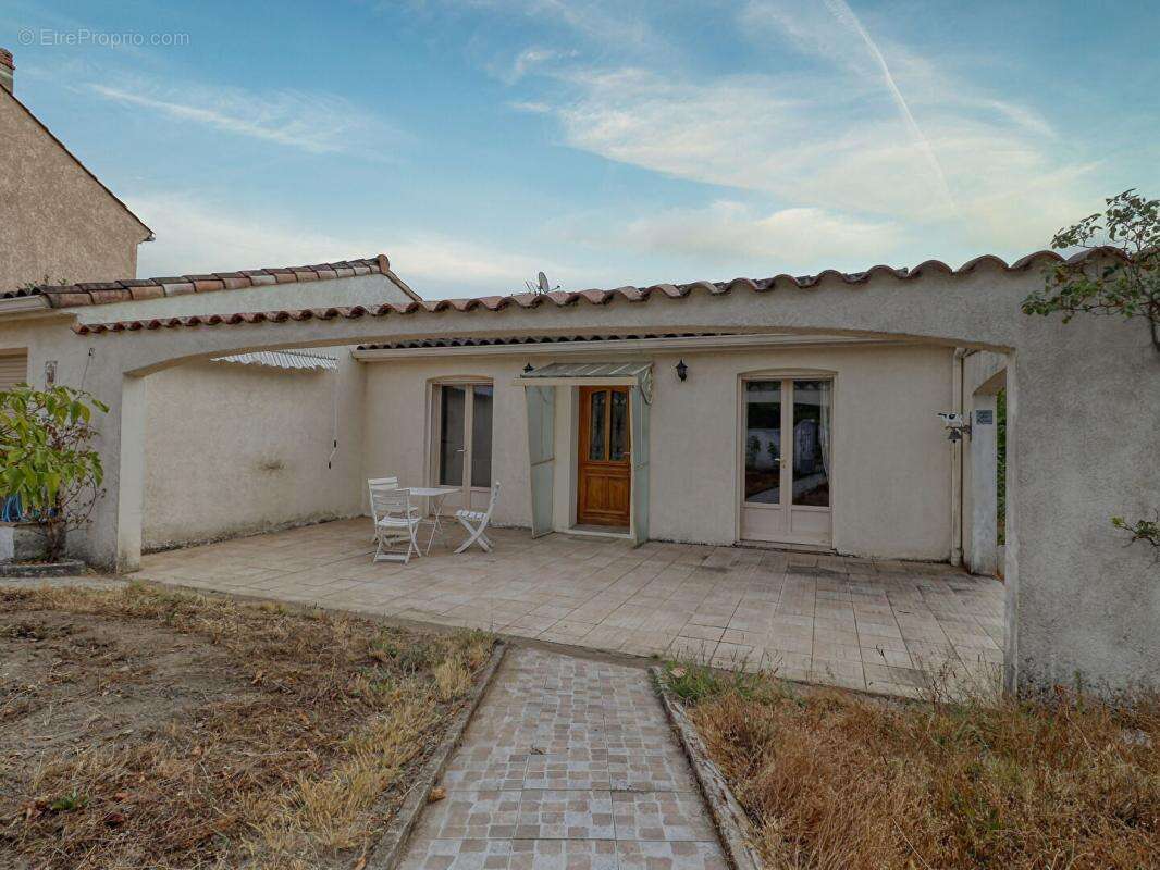 Maison de plain-pied de 110 m² - 3 chambres - Garage - Véranda -Terrain de 682 m² - photo 15