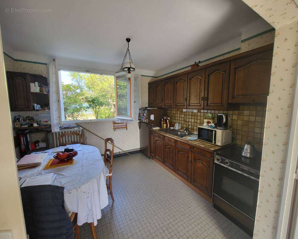 Maison familiale avec fort potentiel – 130 m² habitables (148 m² au sol) – Saint-Herblain Bourg - photo 4