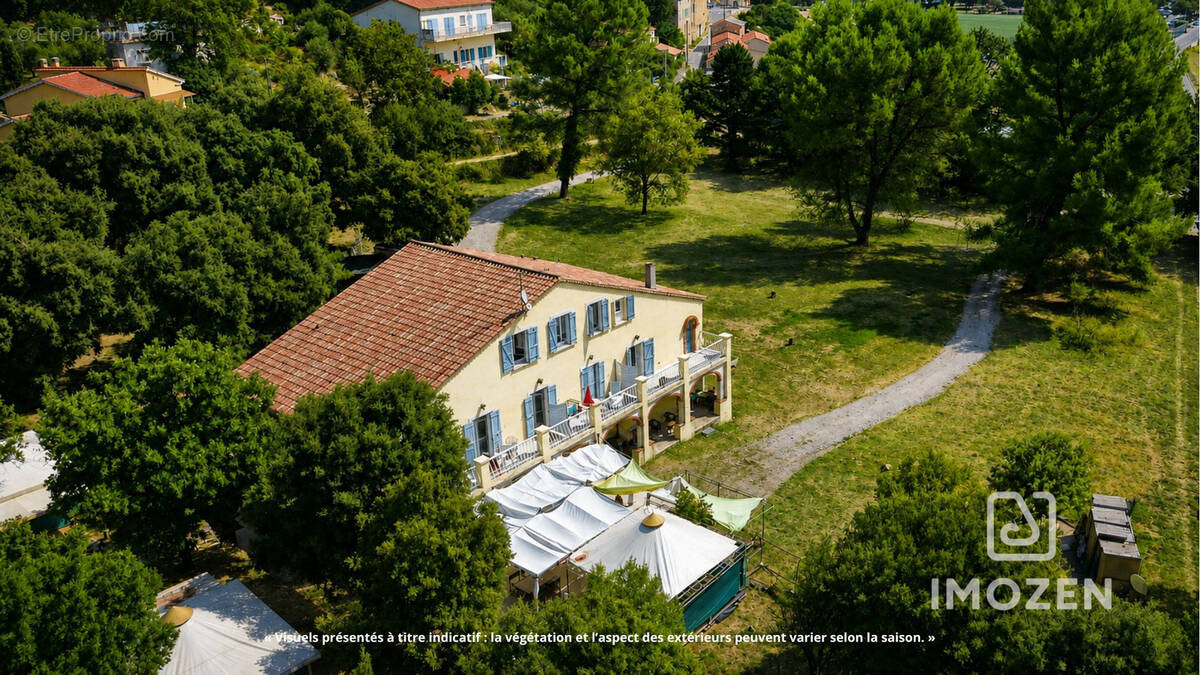 Propriété 334 m2 - 7 082 m2 de terrain -activité locative existante - photo 1