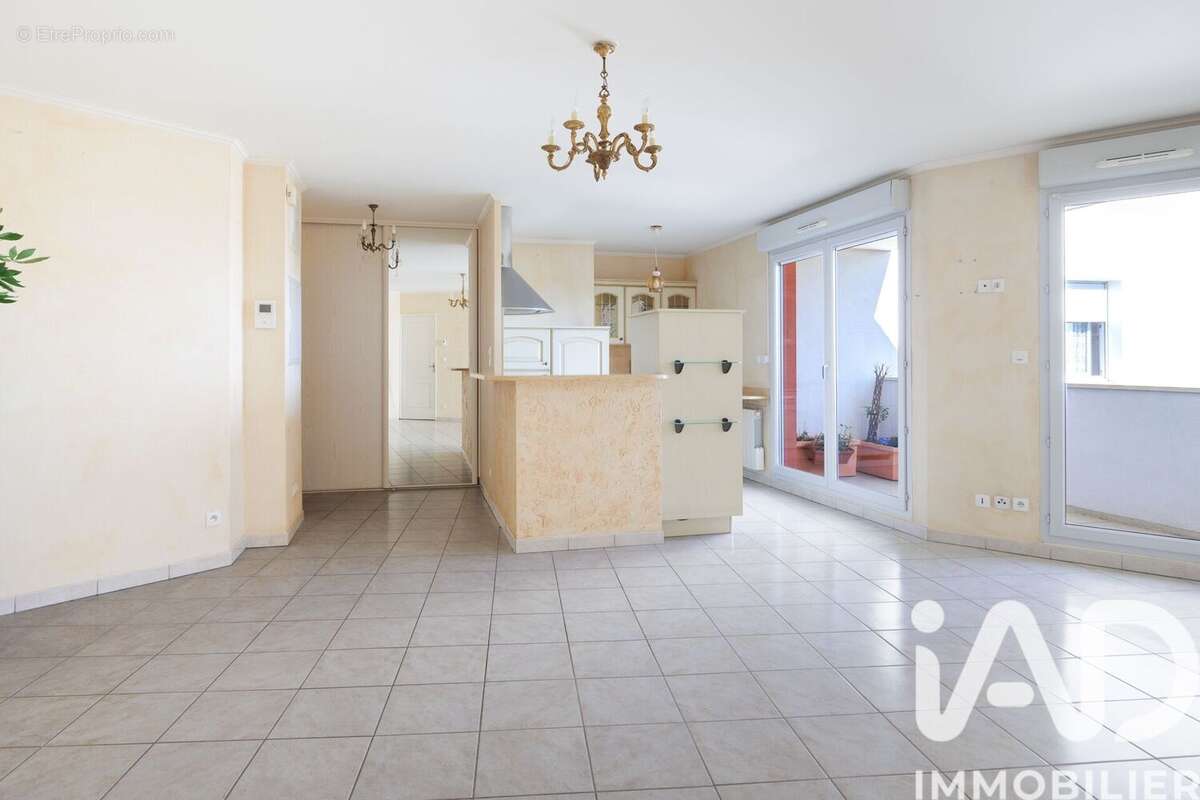 Photo 3 - Appartement à SAINT-GENIS-LES-OLLIERES