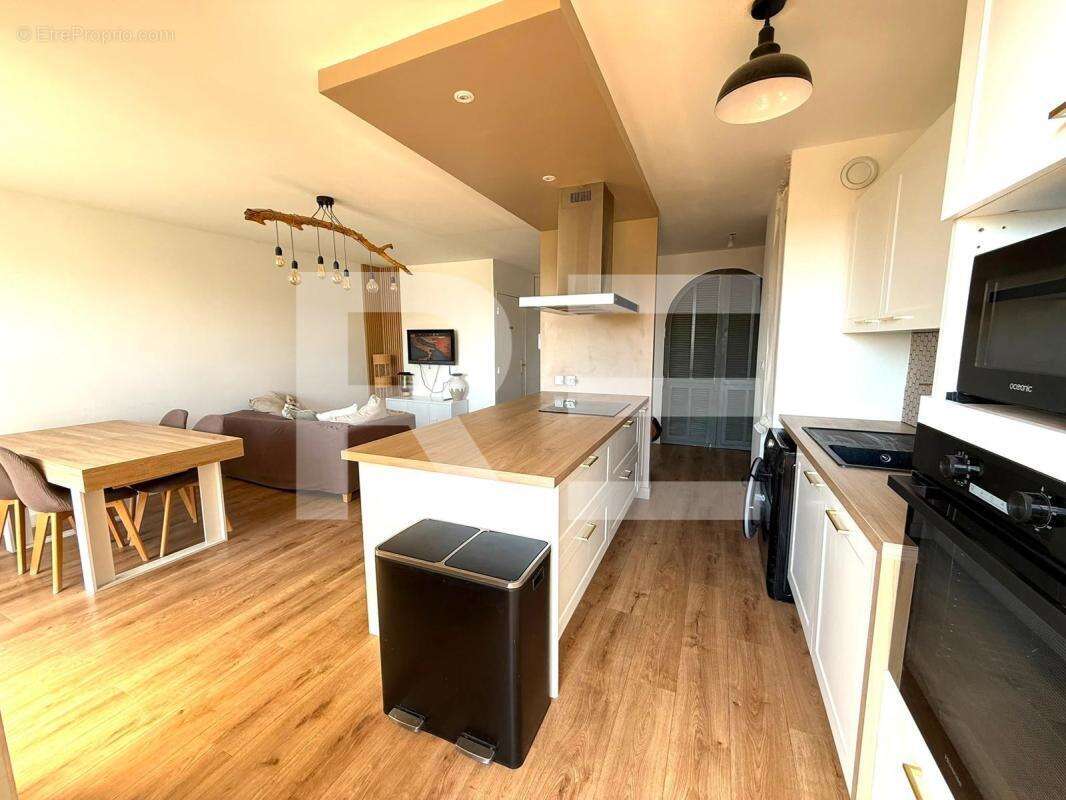 Appartement 65 m² 2 chambres terrasse garage et piscine - photo 4