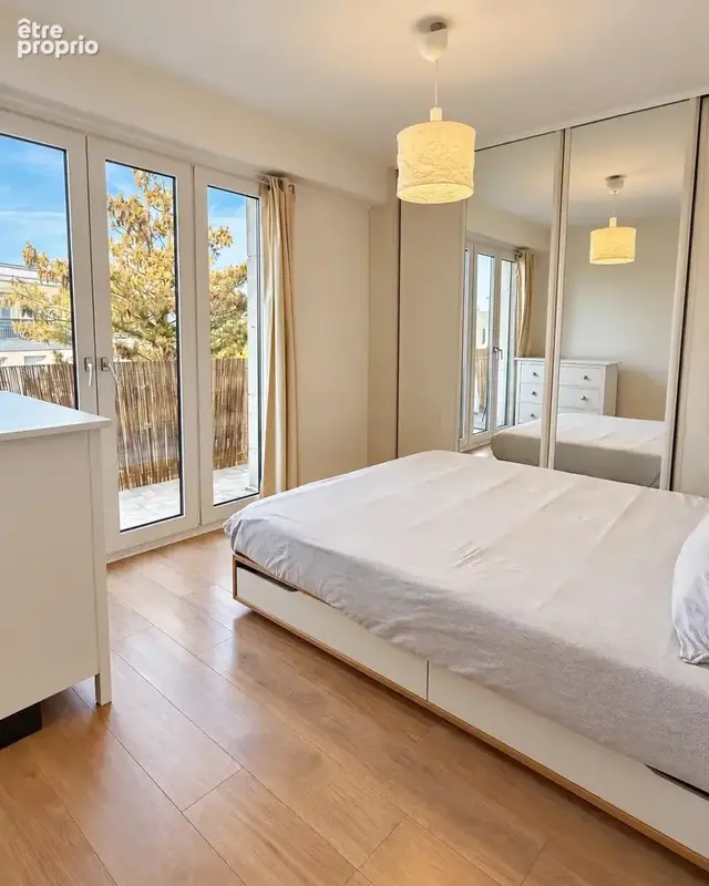3 pièces de 67 m² Dernier étage lumineux double balcon - photo 2