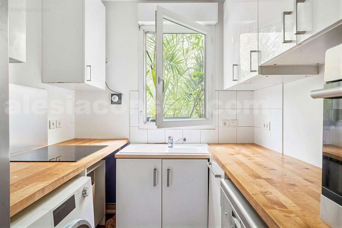 Photo n°5 1 - Appartement à PARIS-14E