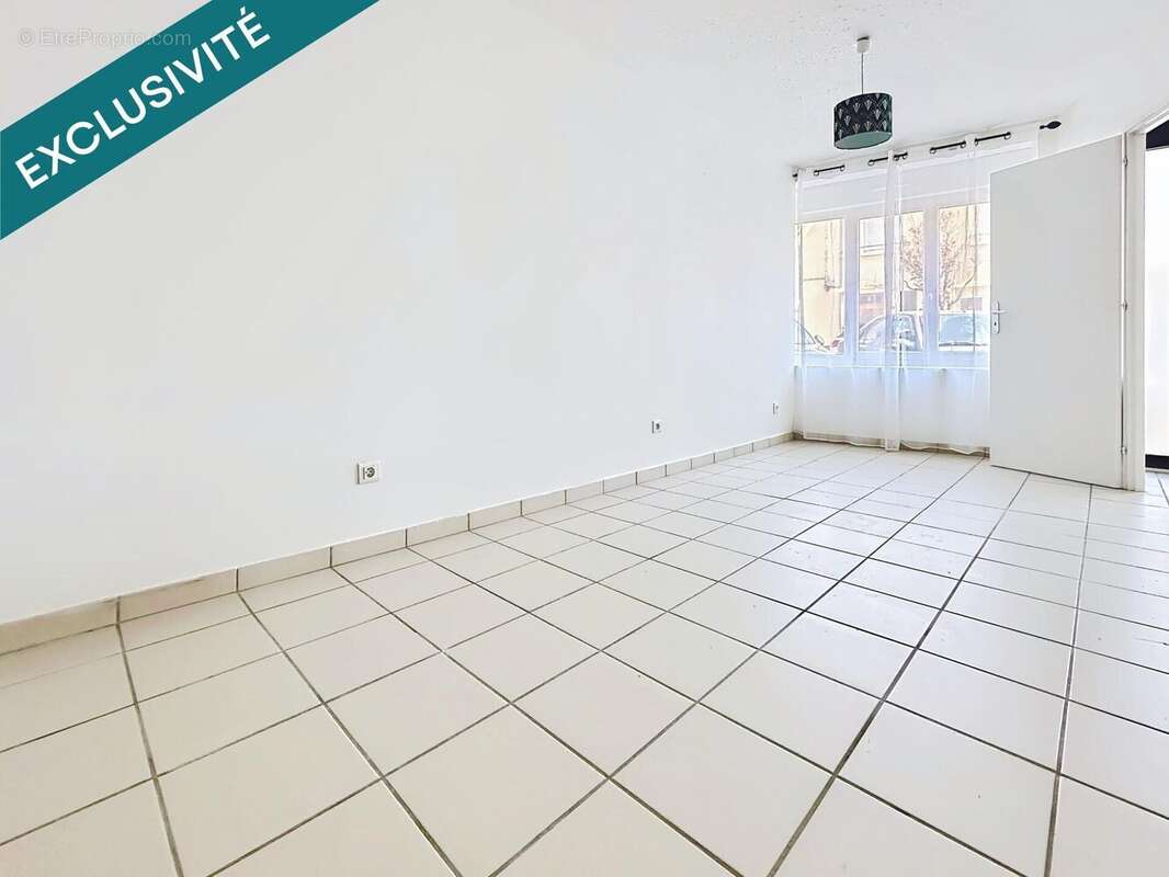 Appartement 57 m² à Pont-Du-Chateau  - photo 4
