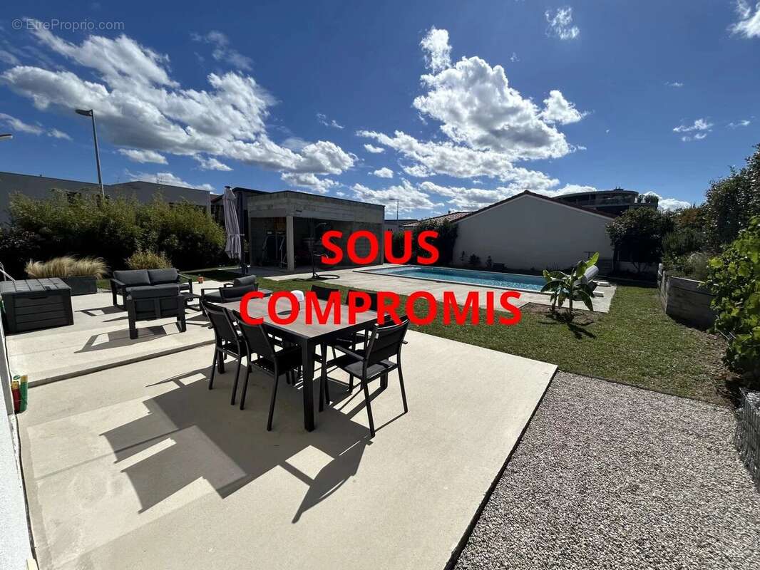 Maison à LA TALAUDIERE