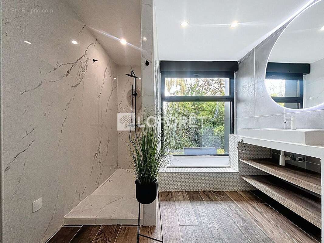 Maison à SAINT-OUEN-DE-THOUBERVILLE