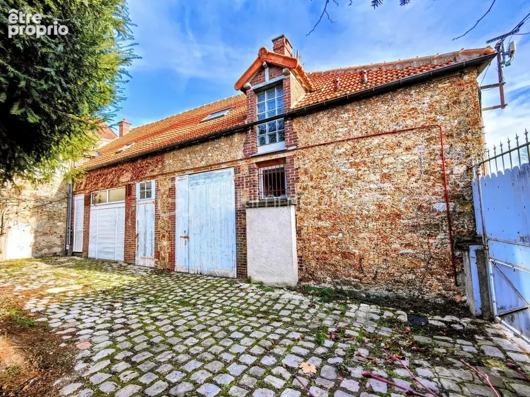 Ensemble immobilier (local commercial + appartement) plein centre ville - photo 21