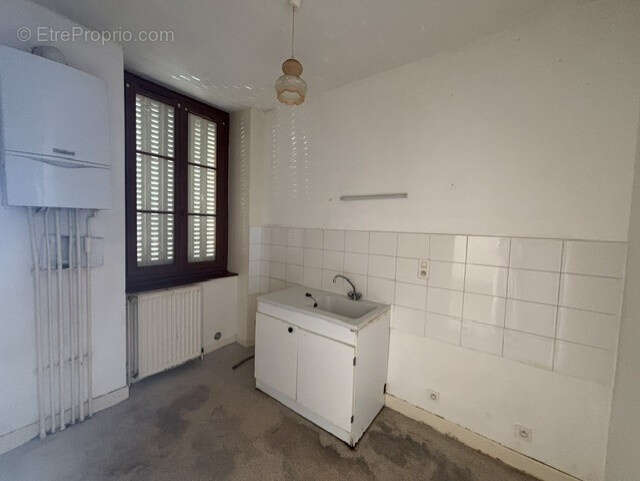 EXCLUSIVITE à AUTUN, T3 en RDC avec balcon et garage. - photo 5