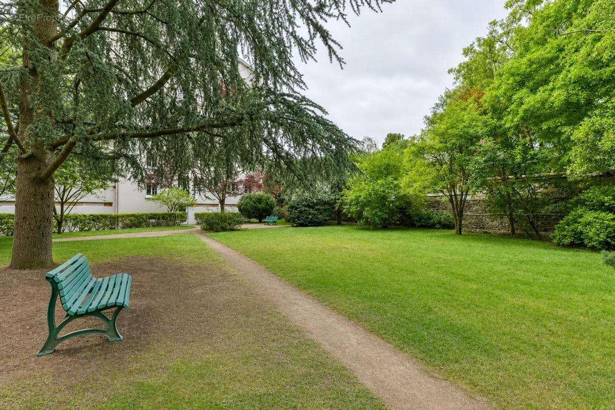 Spacieux T5 de 92 m² avec jardin privé copropriété- - photo 11