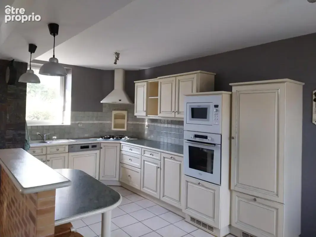 Maison en pierre sur un magnifique terrain arboré avec son plan d'eau - photo 4