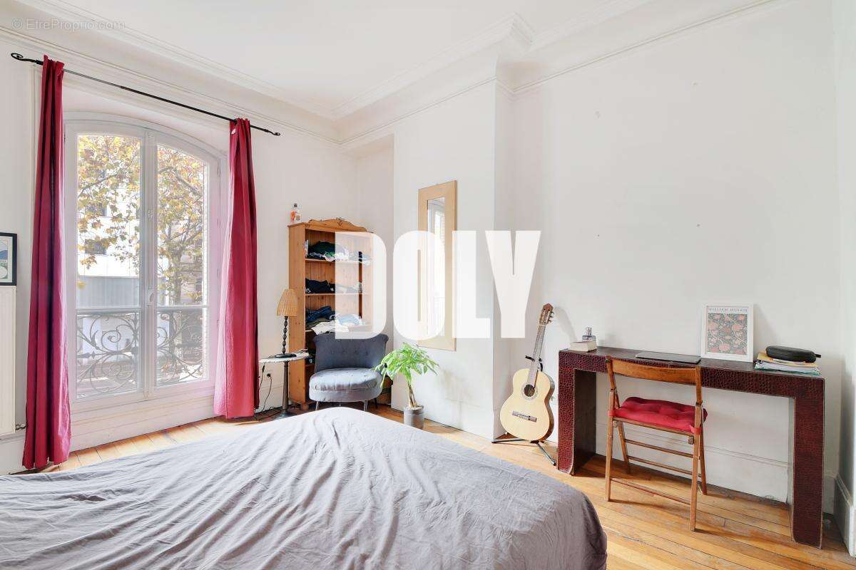Doly- appartement - boulevard ornano - 75018 - photo 8