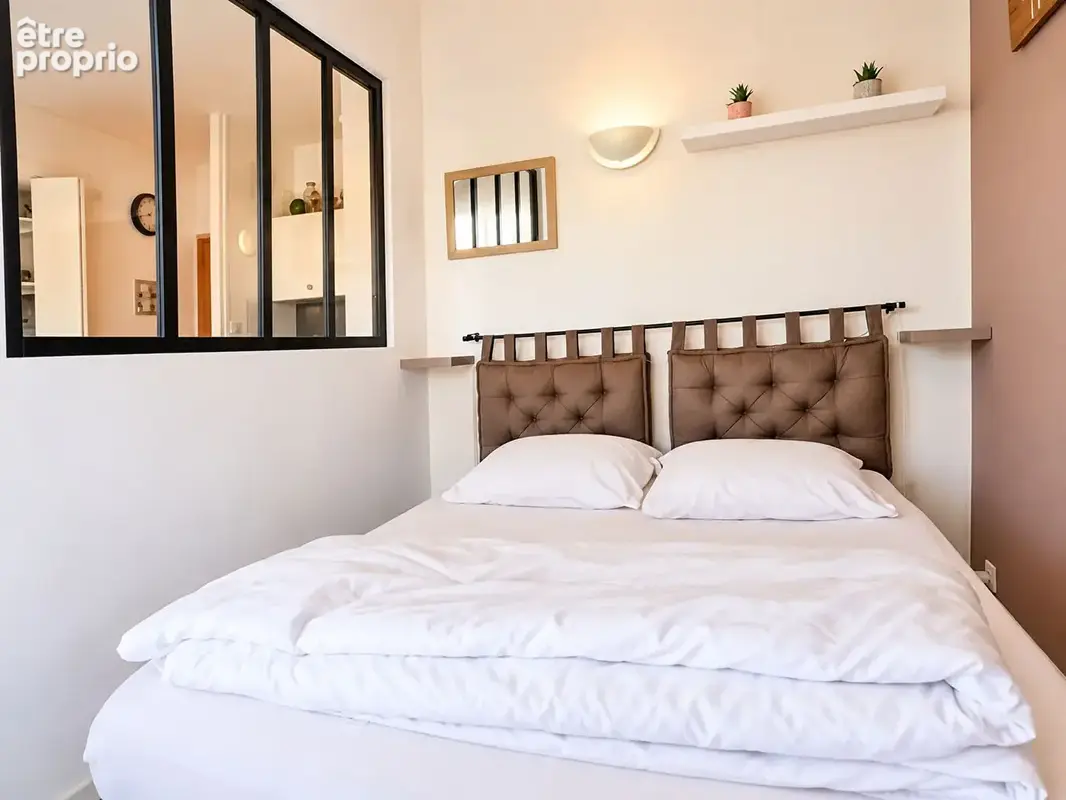 PLAGE & COMMERCES - Appartement en rez-de-jardin avec cave & parking - photo 4
