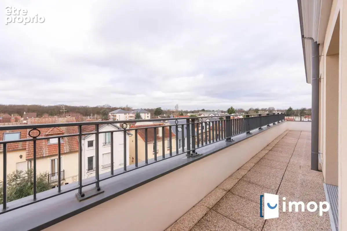 Dernier étage avec terrasse et parkings - photo 12
