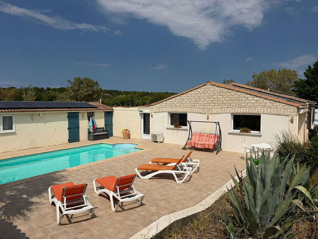 Maison de plain-pied avec piscine sur 3,65 hectares de terrain clos et arboré - photo 9