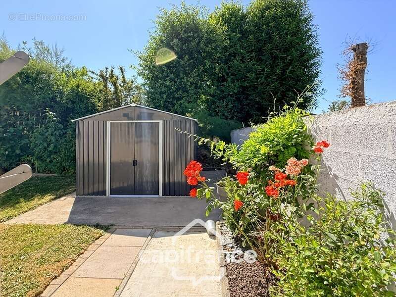 Maison contemporaine de plain-pied de 160 m² – 4 chambres – Véranda de 27 m² avec spa – Double garage – Carport – Noyal-Pontivy - photo 33