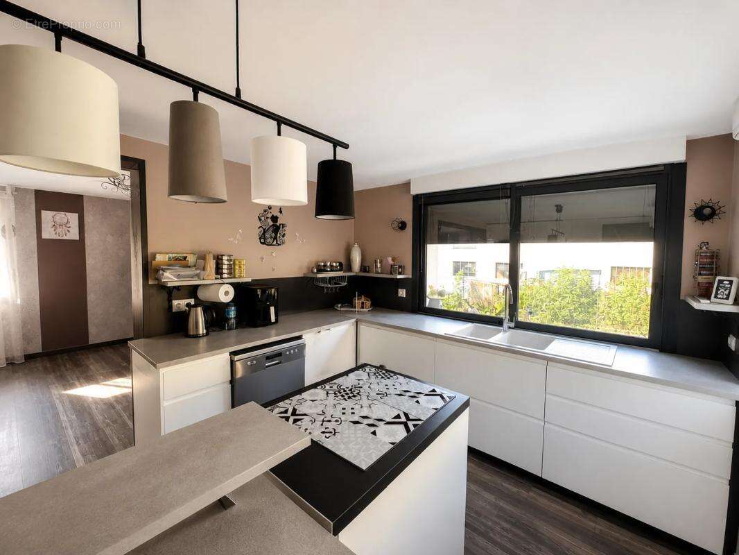 Maison de 6 pièces de 120 m² à Champagnole - photo 4