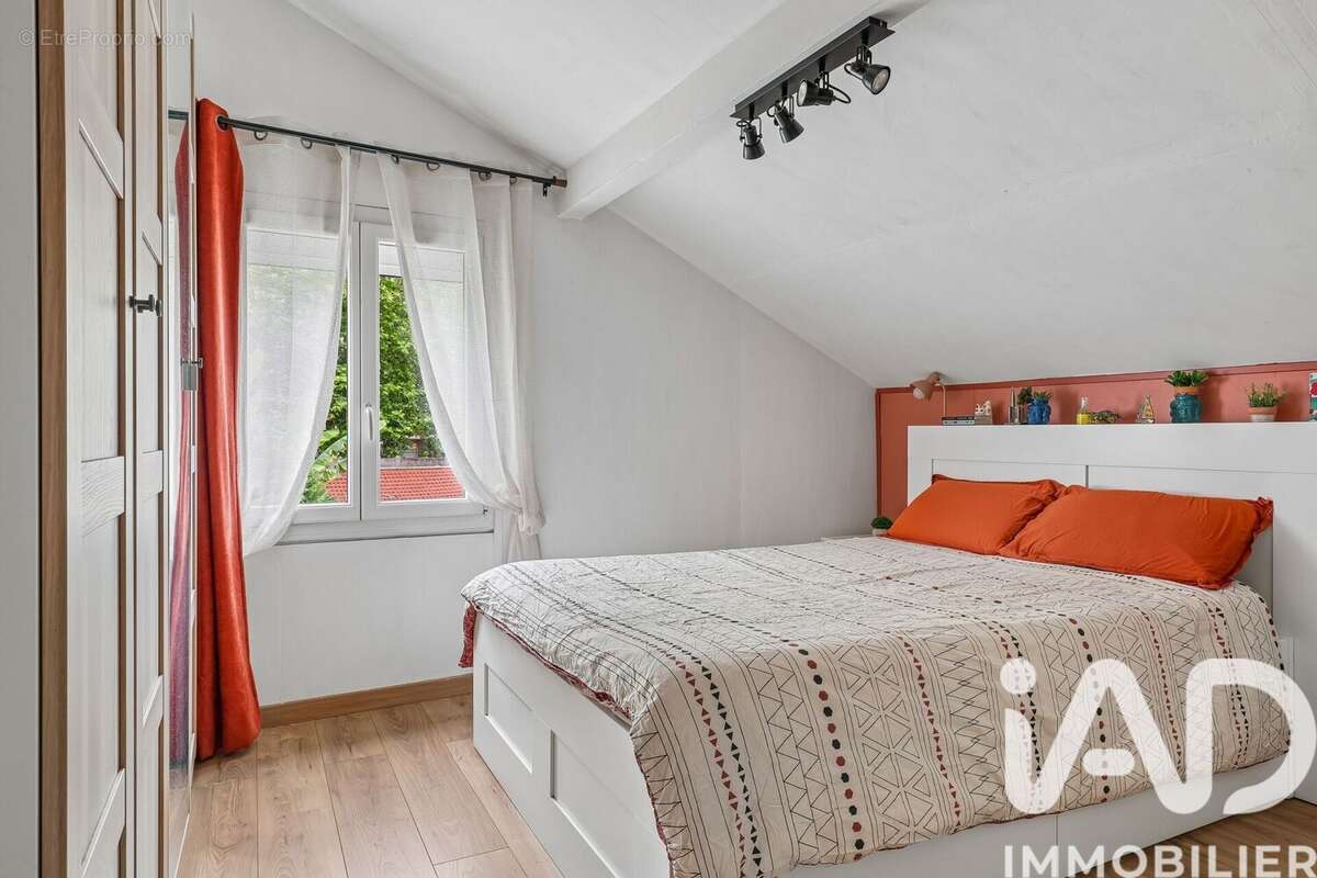 Photo 9 - Maison à VILLEMOMBLE