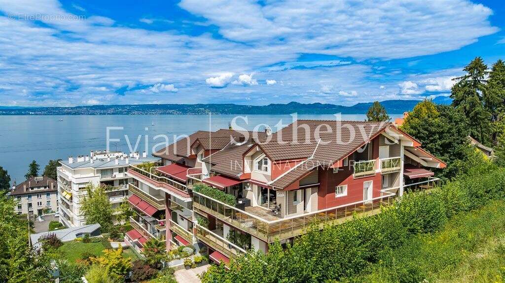 Rare, Evian, T4 en rez de jardin surélevé de 113 m2 avec vue lac et terrasse de 82 m2. - photo 4
