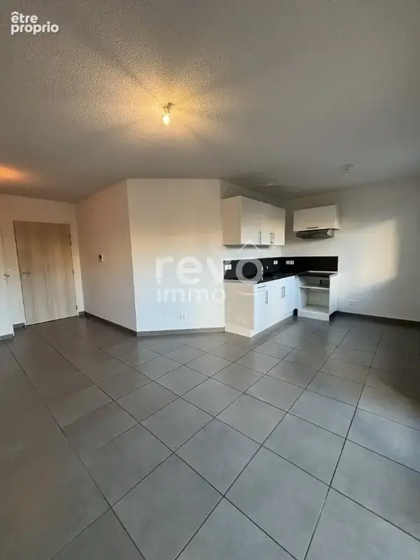 Appartement T2 de 40m² + 19m² de terrain - photo 1