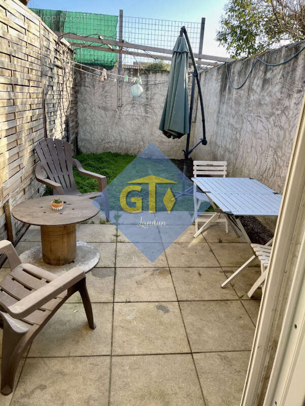 Maison à LAUDUN-L'ARDOISE