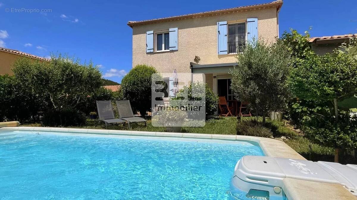 Maison à LAUDUN-L'ARDOISE