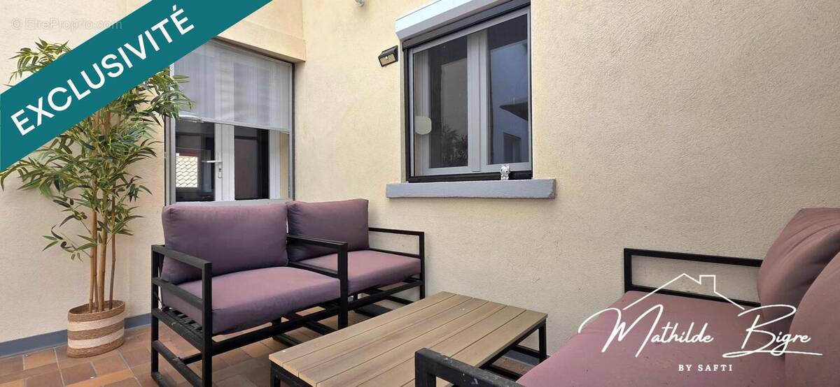 Photo 1 - Maison à PARENTIGNAT