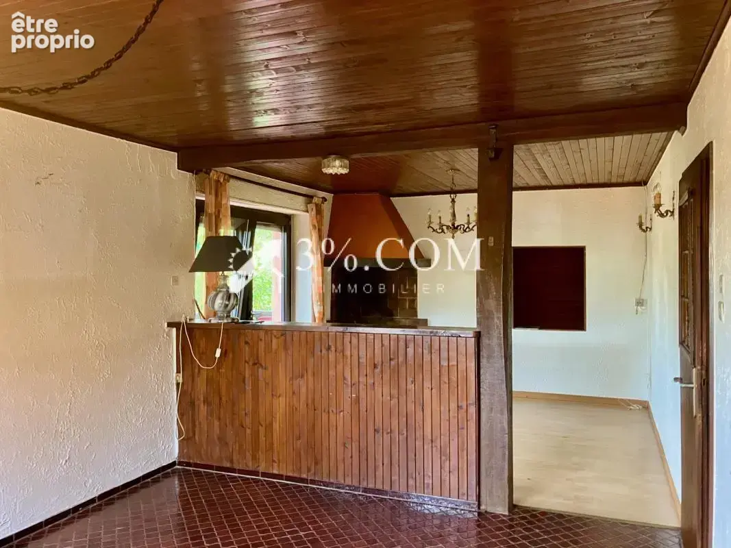 Maison sur les hauteurs avec terrain boisé - photo 8