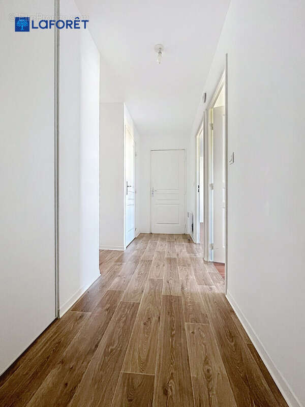 Au Centre de Guidel, Appartement 68m²,  2 chambres, terrasse, jardin, 2 stationnements - photo 7