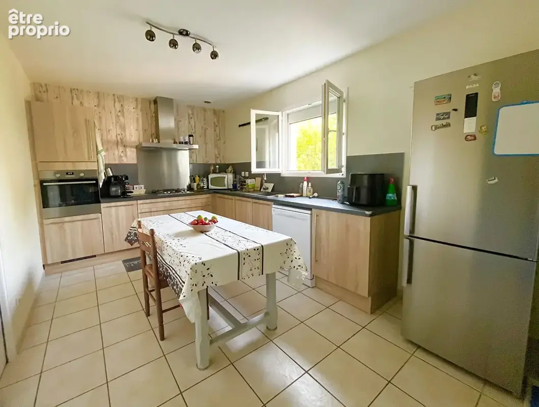 Villeneuve/Lot, secteur Eysses, maison de plain pied avec jardin et garage - photo 4