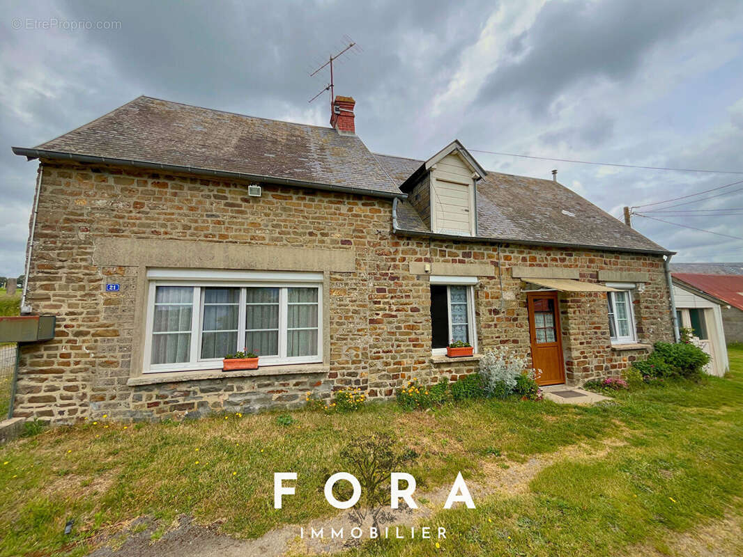 Maison à CONDE-SUR-NOIREAU