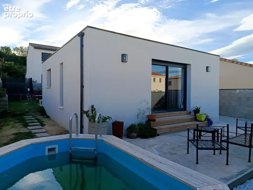 Maison de plain-pied T4 de 96 M2 sur 326 M2 de terrain - photo 8
